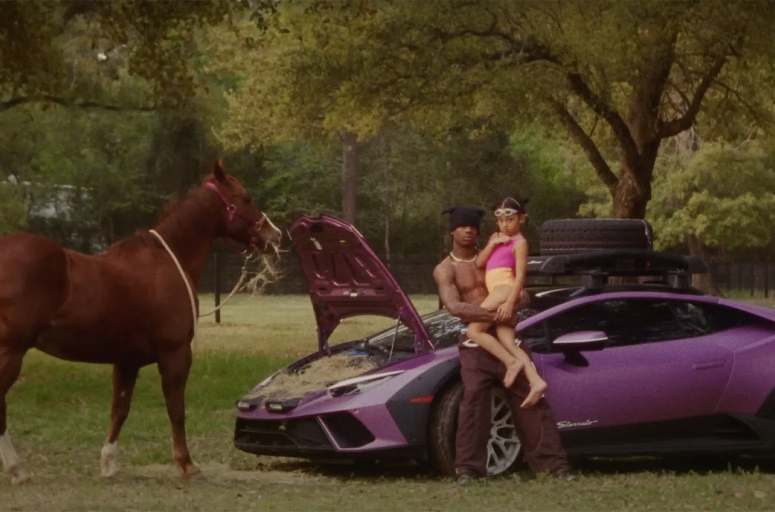 Travis Scott Brings Lamborghinis To the Stables & the Strip Club In Countryside ‘Kick Out’ Video