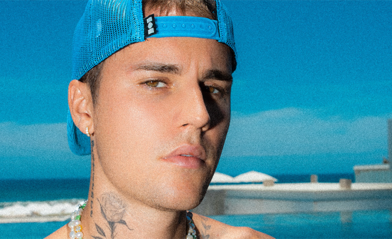 Justin Bieber Takes His ‘Chicken Legs’ for a Night Swim in ‘First Place’ Music Video: Watch