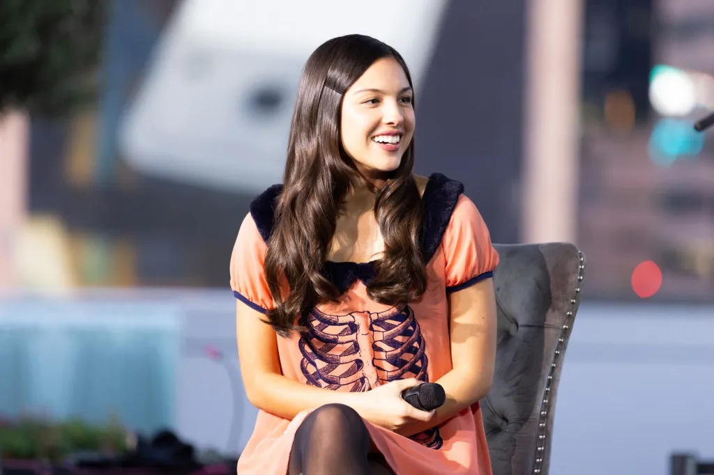 Olivia Rodrigo Opens Up About ‘GUTS’ Pressure & Finding Joy on ‘Sad’ New Album at Grammy Museum