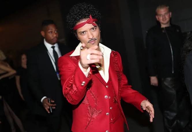 Bruno Mars Has Playful Response to Seeing Drake Dancing With His ‘Latina Crush’ Karol G: ‘I Will Get Her Back’
